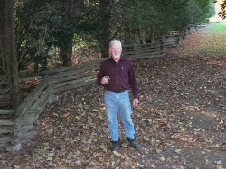 photo of Doug near split rail fence